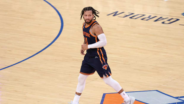 Jalen Brunson runs down the court.